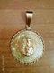 Medalla preciosa de santa barbara de oro 18k pesa 16.8 
