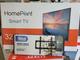 Smart tv de 32 HomePoint con soporte a la pared nuevo con g